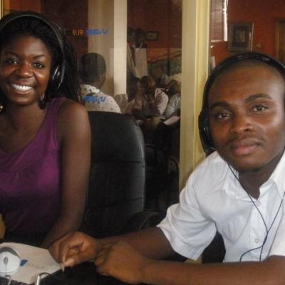 A journalism intern with a Projects Abroad supervisor at a journalism placement in Ghana A journalism intern in Ghana with a supervisor